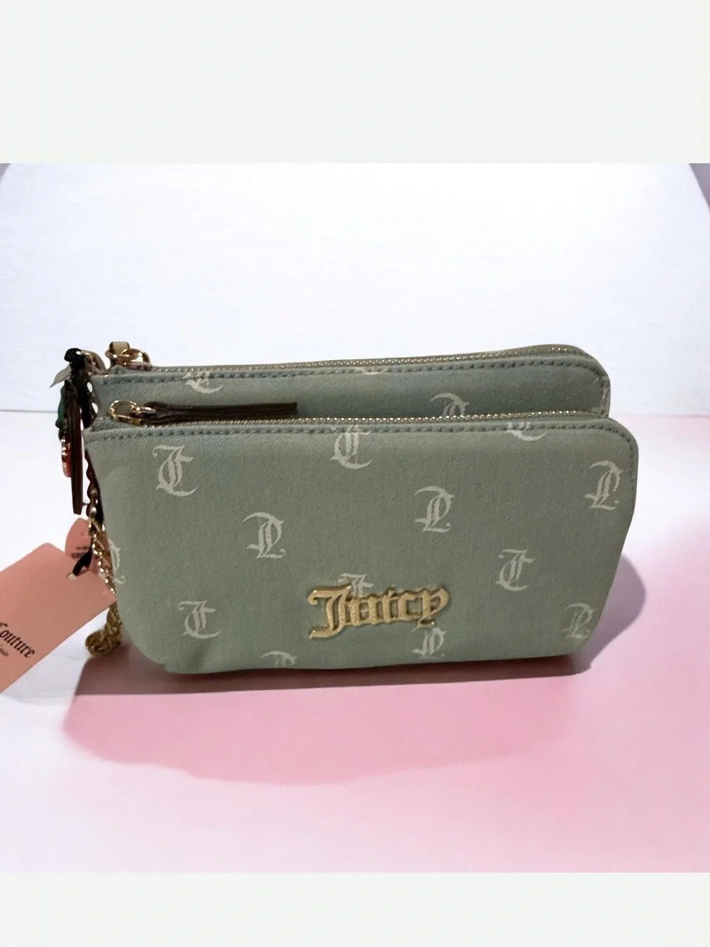 Juicy Couture light denim Monogram Canvas Wristlet with strawberry charm
